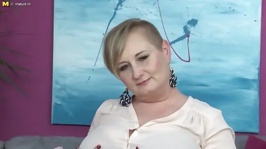 Big breasted housewife plays with her wet pussy