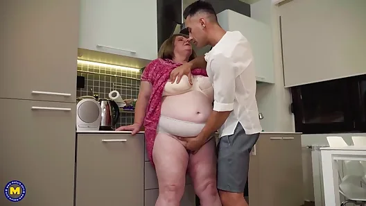 Big fat granny takes young cock