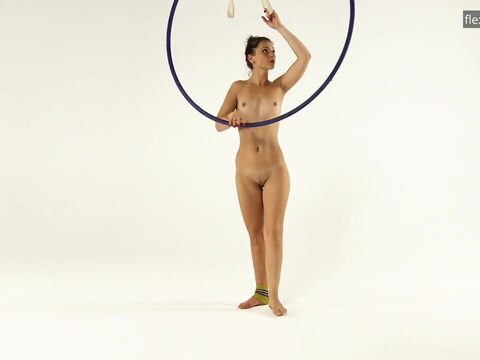 Kim Nadara in yellow socks showing off her flexibility