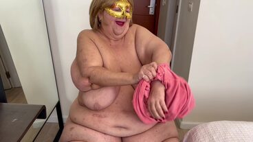 Fat grandmother opens juicy pussy