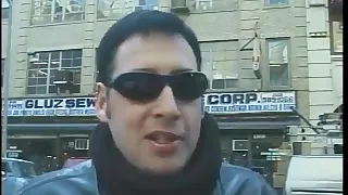 Hot dominatrix in leather with a great body puts a guy in clamps